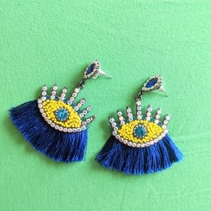 Golden eye earrings